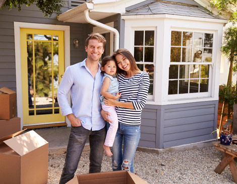 Young Family Moving into House Young Family Moving into House
